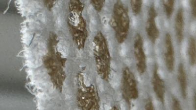 Interwoven textile surface structure